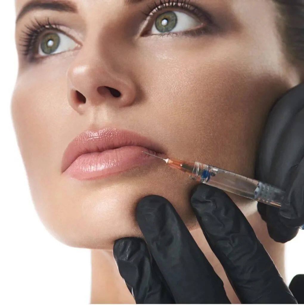 A clinician injecting a neuromodulator above a patient's brow